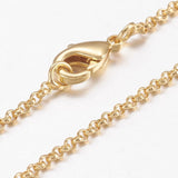 zoomed in sections of golden rolo chain necklace with lobster claw clasp on white background. 