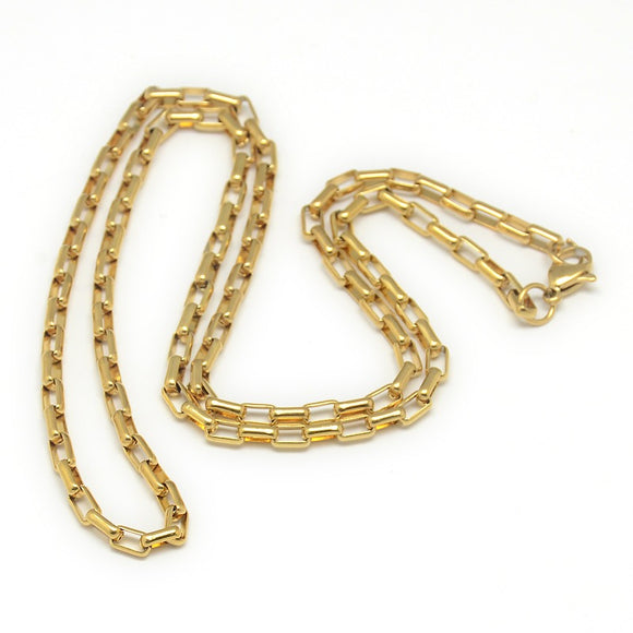 golden rectangle box chain necklace with lobster claw clasp on white background. 