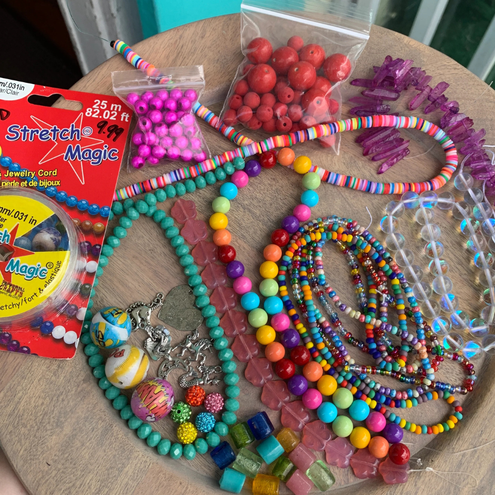 assorted jewelry making supplies perfect for waist beads, beaded bracelets and more. includes glass beads, crystal beads and stone beads