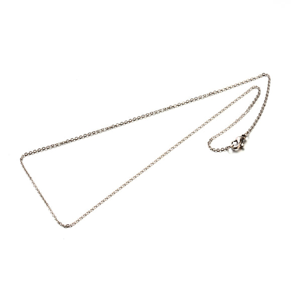 silver tone fine flat cable chain necklace with lobster claw clasp on a white background. 
