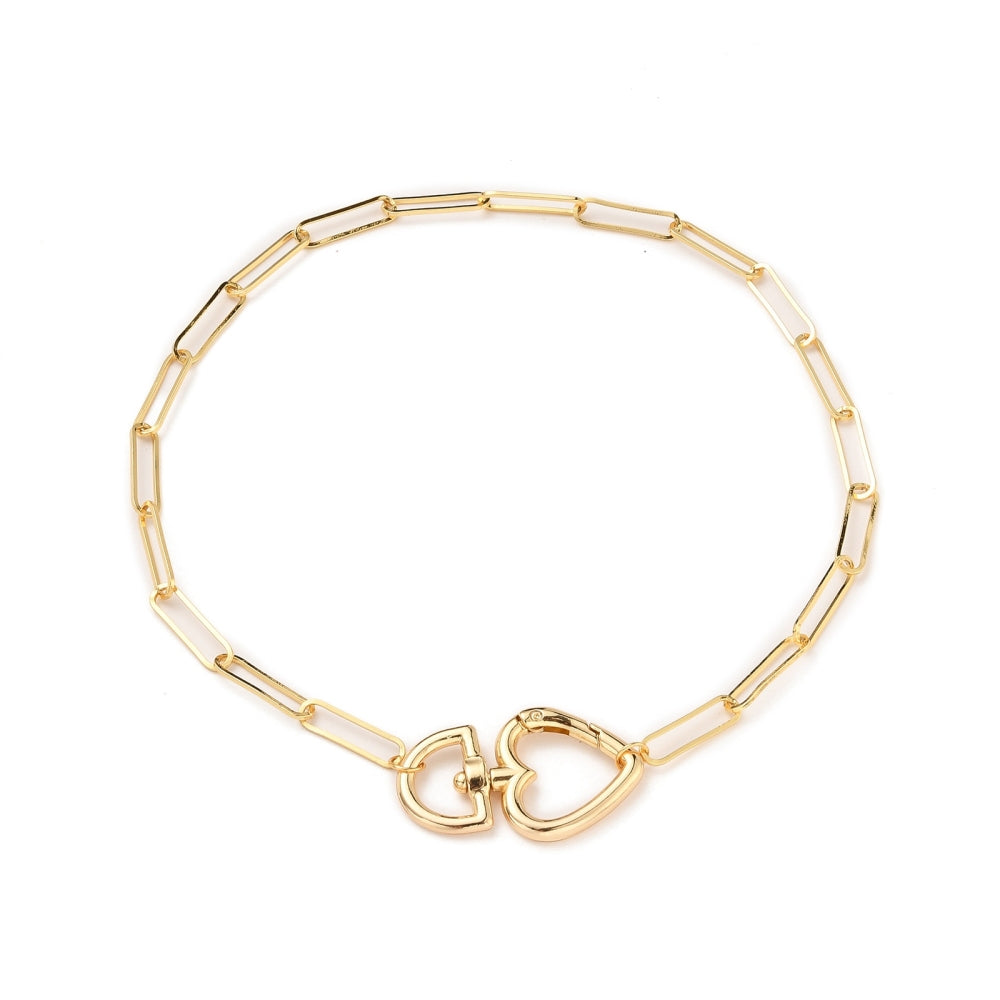 plated brass paperclip link chain with swivel heart clasp on white background. 