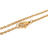 zoomed in sections of golden cable chain with lobster claw clasp on white background. 