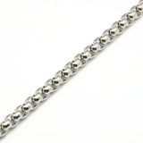 zoomed in section of silver tone heavy Venetian box chain necklace over white background. 