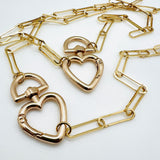 2 plated brass paperclip link chains with swivel heart clasp on white background. 