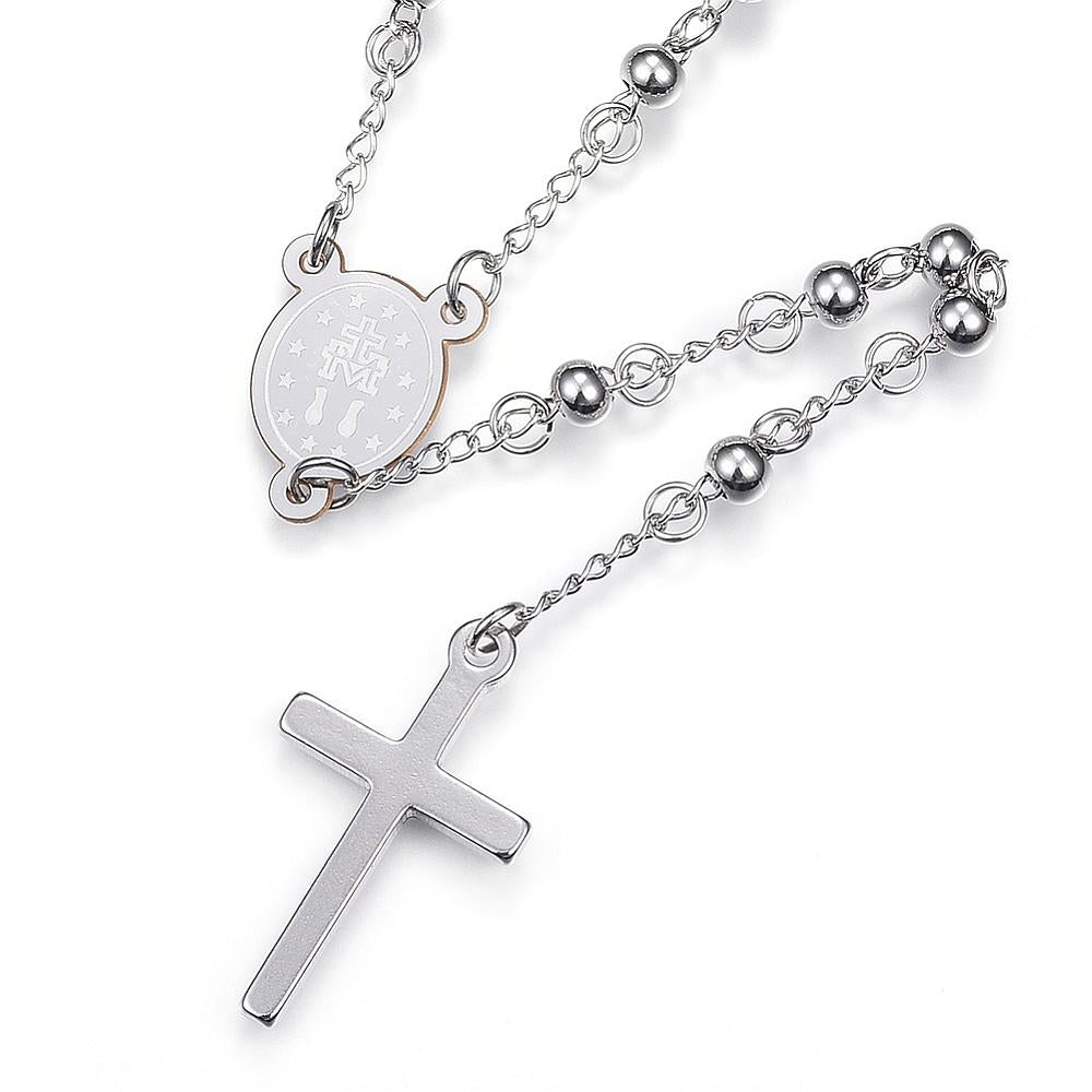 silver tone beaded Rosary with back of miraculous medal and cross pendant over white background. 