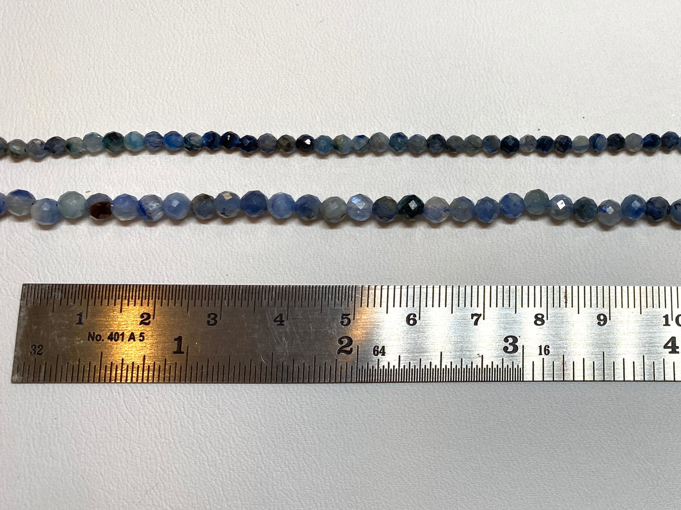 Kyanite Tiny Faceted Rounds