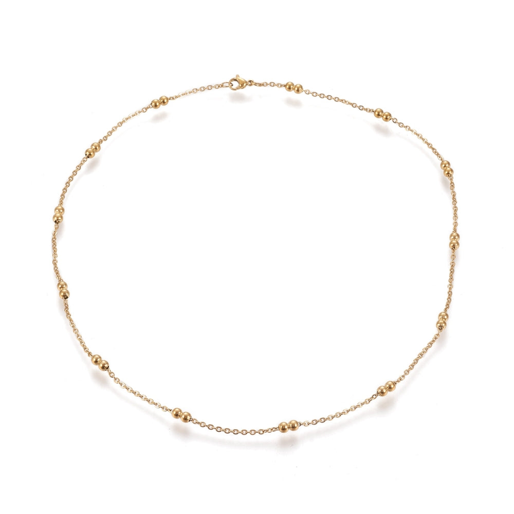 golden cable link double satellite chain necklace with lobster claw clasp on a white background. 