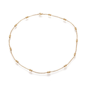 golden cable link double satellite chain necklace with lobster claw clasp on a white background. 