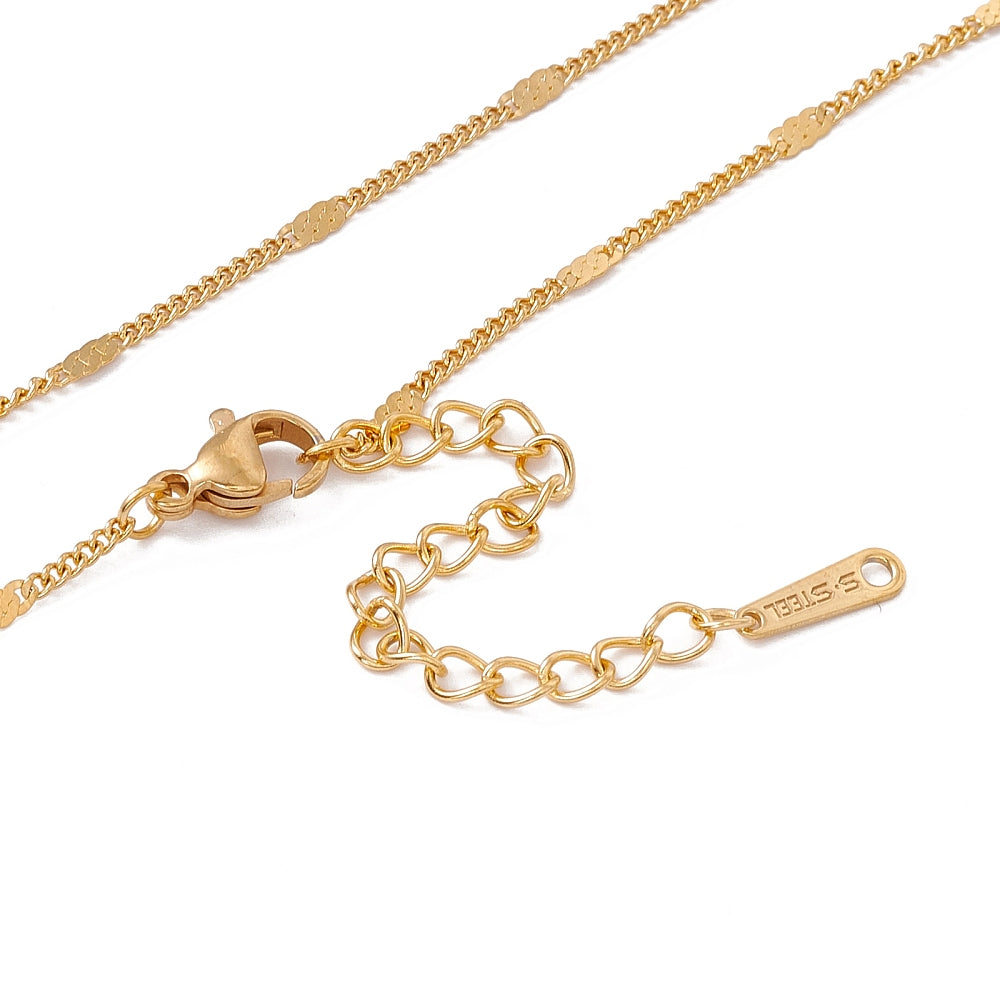 zoomed in sections of golden flat satellite curb chain with lobster claw clasp  and extender on  white background. 