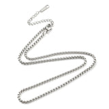 silver tone Venetian box chain necklace with lobster claw clasp and extender chain over white background. 