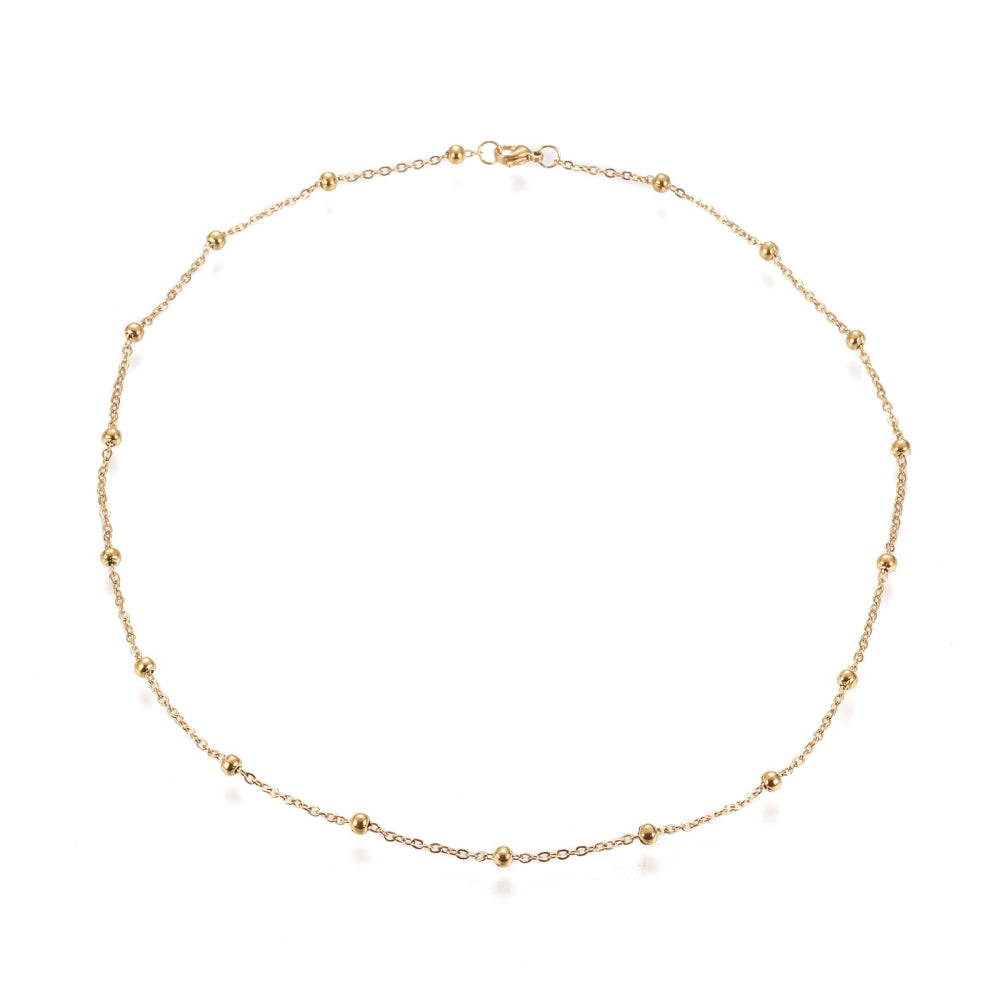 golden large bead satellite chain necklace with lobster claw clasp on white background. 