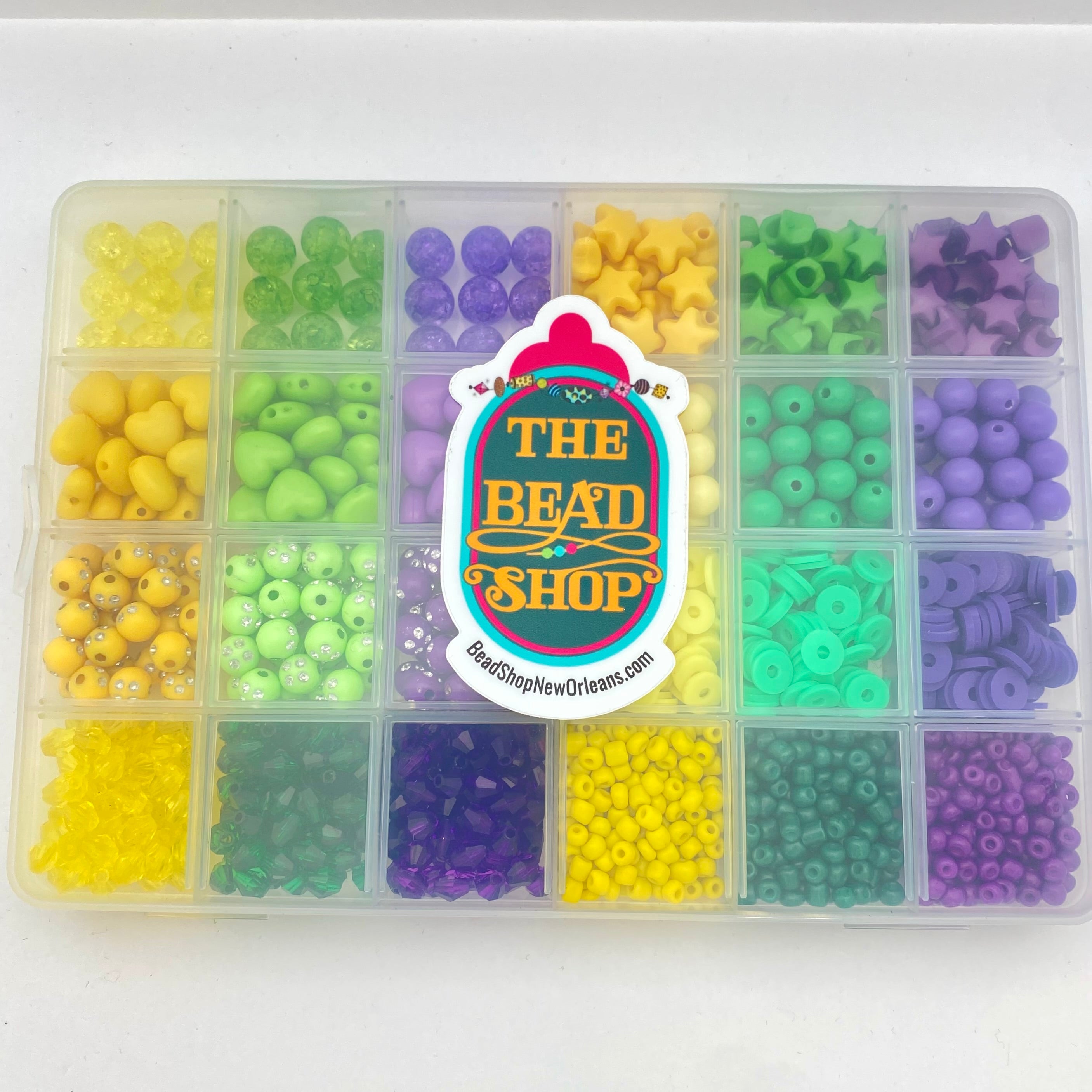 closed Mardi Gras bead box with The Bead Shop logo on the front over a white background. 