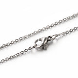 zoomed in section of stainless steel fine flat cable chain necklace with lobster claw clasp on a white background. 