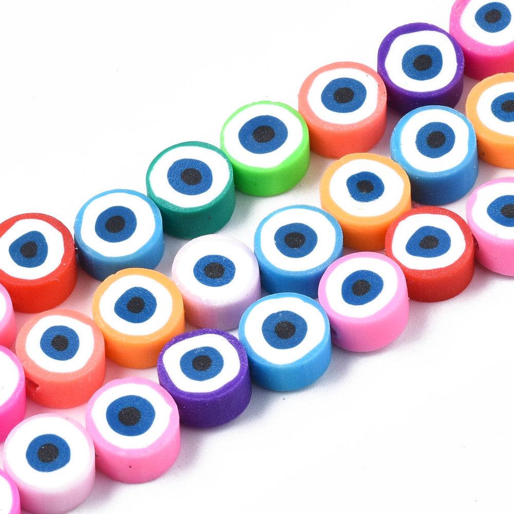 zoomed in sections of three multicolor polymer clay round eye bead strands over white background. 