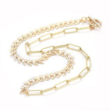 golden mixed chain necklace with both cob leaf and paperclip links and toggle clasp on white background. 