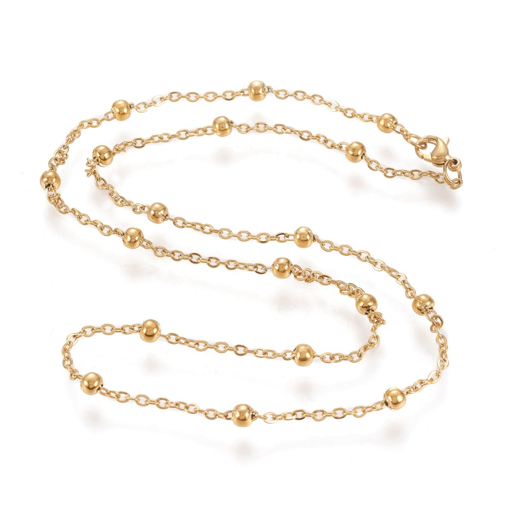 golden large bead satellite chain necklace with lobster claw clasp on white background. 