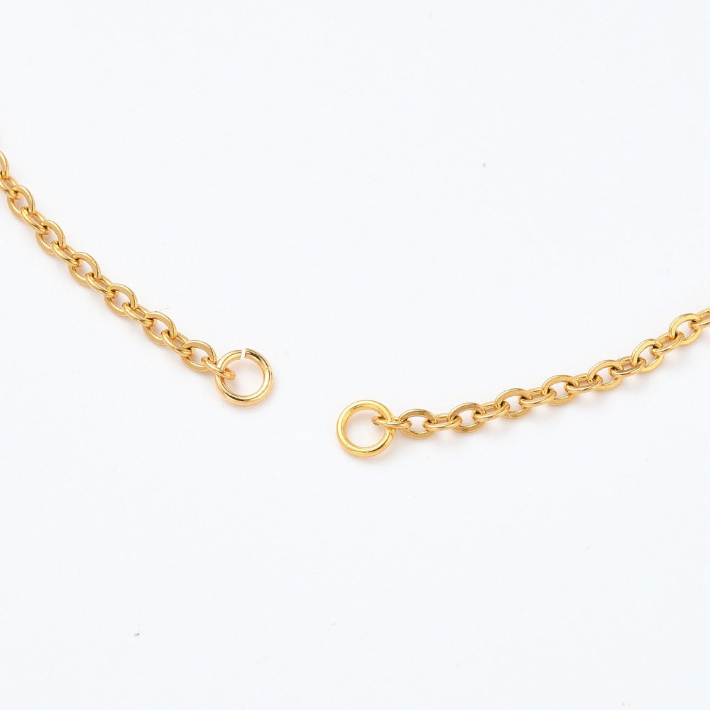 zoomed in section for installing bracelet center piece of golden bolo style cable chain bracelet making on white background. 