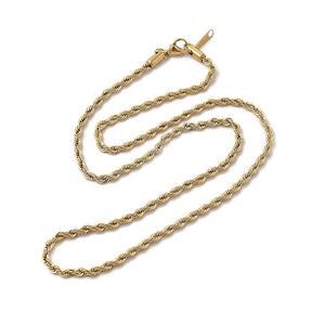 golden rope chain with lobster claw clasp on white background. 