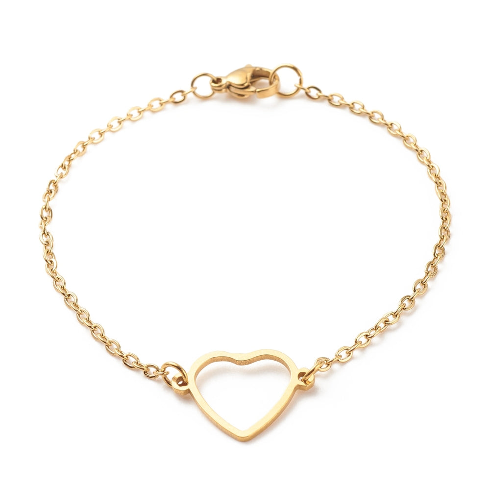 golden cable chain bracelet with center heart focal and lobster claw clasp on white background. 