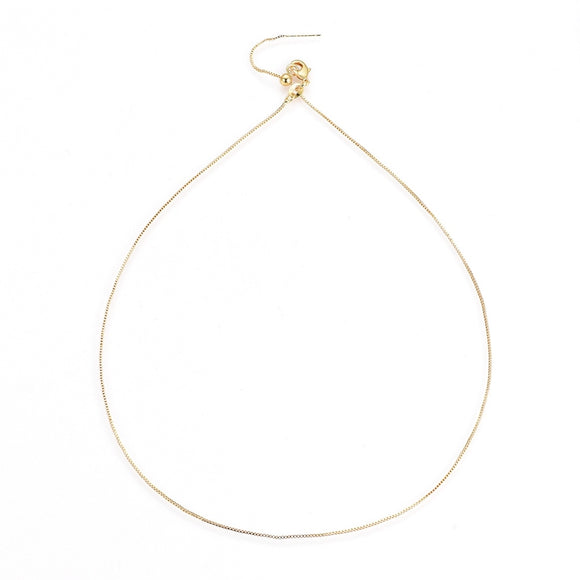 gold plated brass, adjustable box chain with lobster claw clasp on a white background.