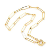 golden paperclip chain necklace with large spring ring clasp on white background. 