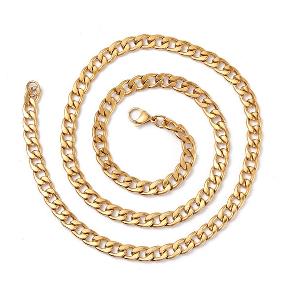 golden curb link chain necklace with lobster claw clasp on a white background. 