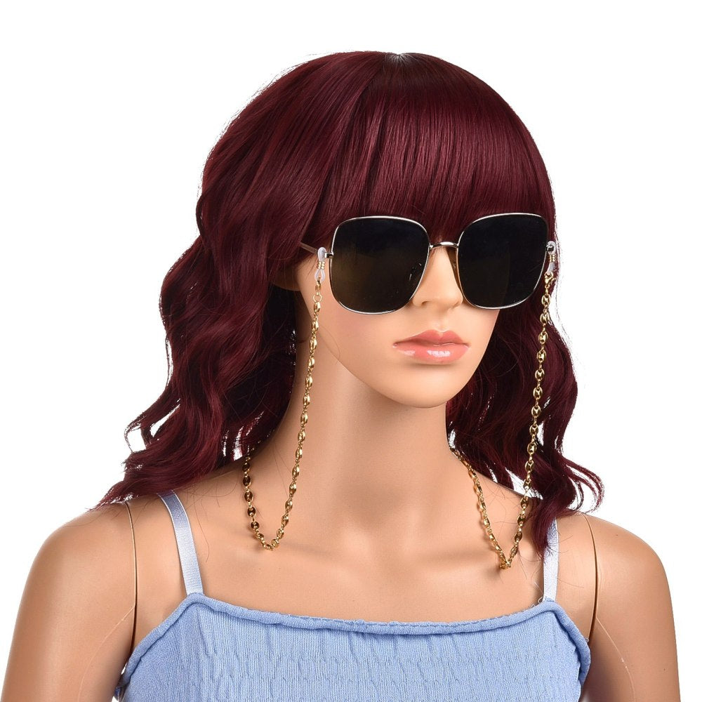 golden coffee bean link eyeglass chain with lobster claw clasps and rubber loop ends attached to large sunglasses displayed on mannequin with long burgundy hair and light blue shirt against a white background. 