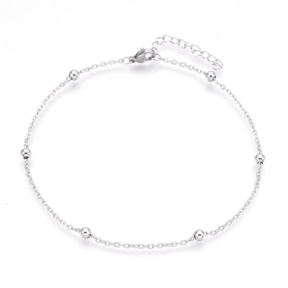 silver tone satellite chain anklet with lobster claw clasp and extender chain over white background. 