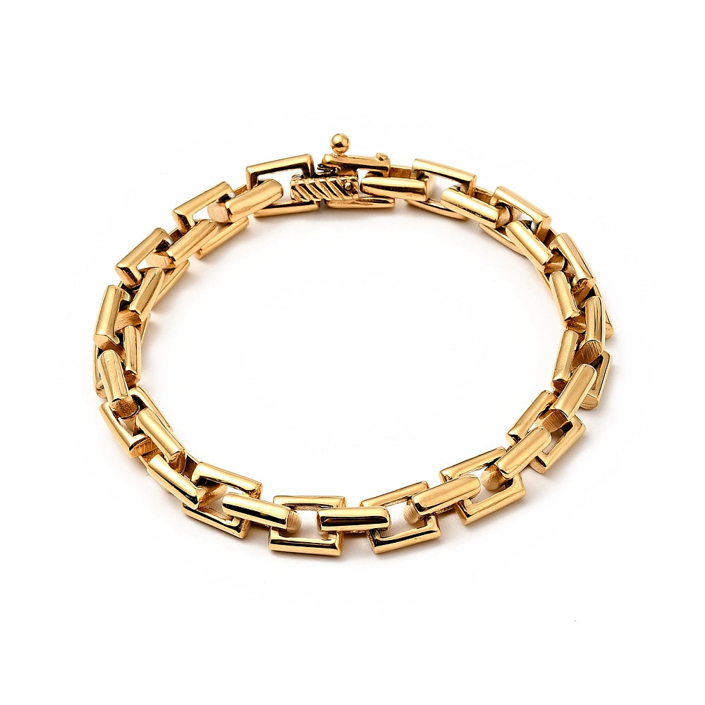 golden heavy rectangle link chain bracelet with hinged clasp over white background. 