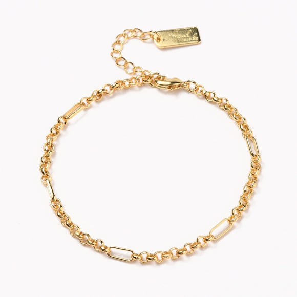 golden rolo figaro link bracelet with lobster claw clasp and extender chain . 