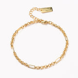 golden rolo figaro link bracelet with lobster claw clasp and extender chain . 