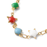 zoomed in section of golden multi-colored enamel heart and star links over white background. 