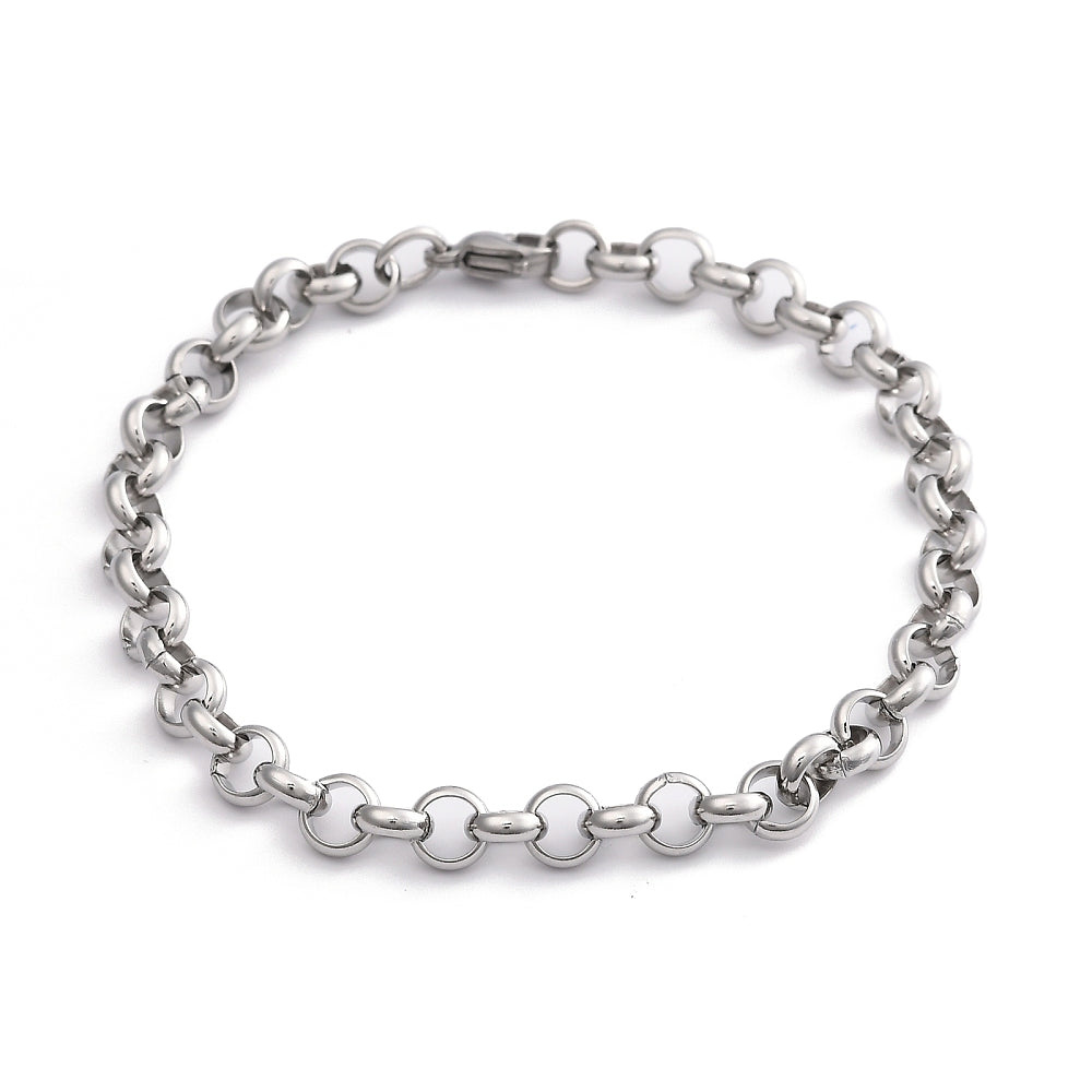 silver tone rolo chain bracelet with lobster claw clasp over white background .