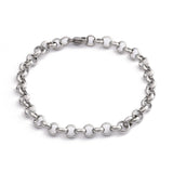 silver tone rolo chain bracelet with lobster claw clasp over white background .