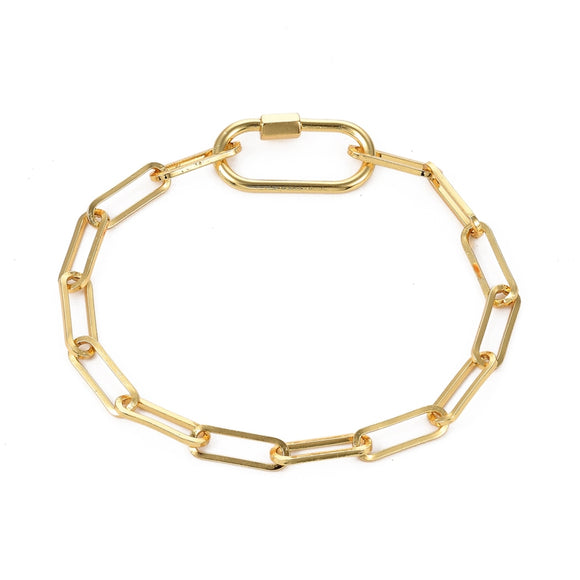 golden paperclip chain bracelet with carabiner clasp over white background. 