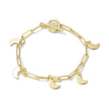 golden paperclip chain bracelet with toggle clasp and five evenly spaced crescent moon charms over white background. 
