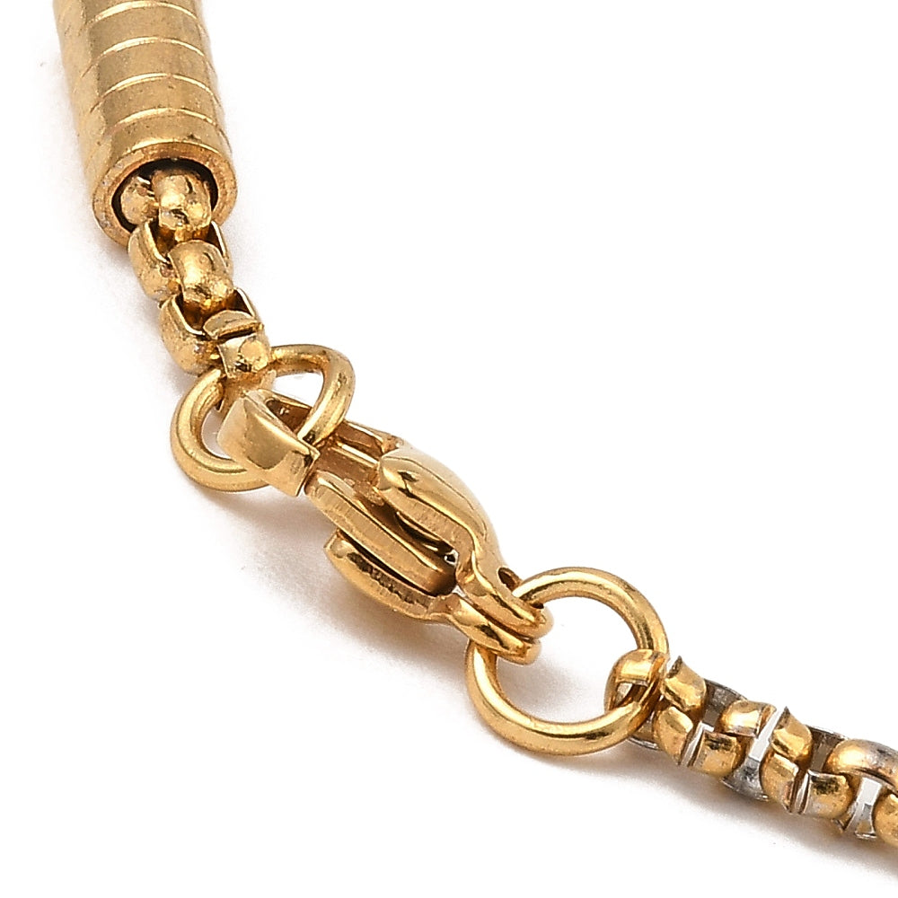 zoomed in section of golden column link and box chain bracelet with lobster claw clasp over white background. 