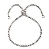 silver tone bolo bracelet with stopper bead and jump rings on ends over white background. 