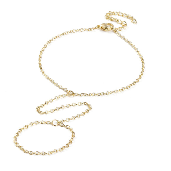 golden hand chain bracelet with lobster claw clasp and extender chain over white background. 