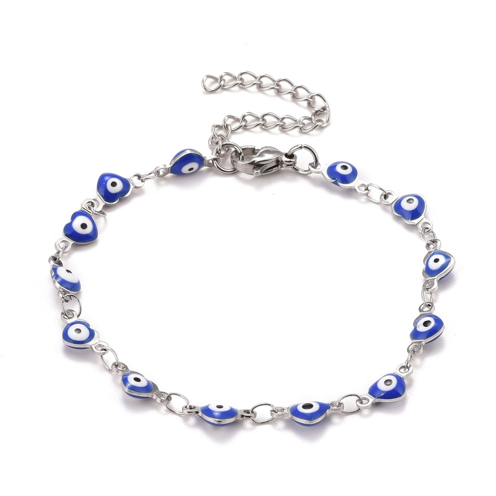 silver tone and blue enamel heart shaped evil eye bracelet with lobster claw clasp and extender chain over white background.