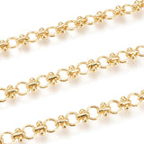 zoomed in sections of golden bar and circle link chain over white background. 