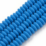 four blue polymer clay saucer bead strands over white background. 