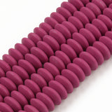 four maroon polymer clay saucer bead strands over white background. 