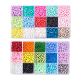 two fifteen compartment plastic bead storage bins with a variety of colors of round seed beads in one and flat disc beads in the other over white background. 