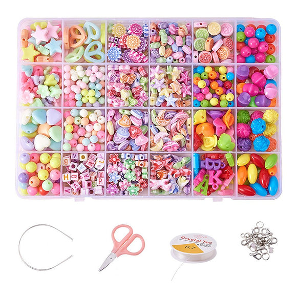 twenty-four compartment bead box containing a vibrant assortment of candy like beads along with the some pendant hooks scissors stretch cord and headbands over white background. 