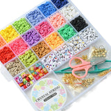 twenty six compartment plastic bead storage bin with eighteen different color Heishi beads as well as an array of colorful letters and symbols plus small bags of golden charms and findings a spool of cord and a pair of scissors and tweezers over white background. 