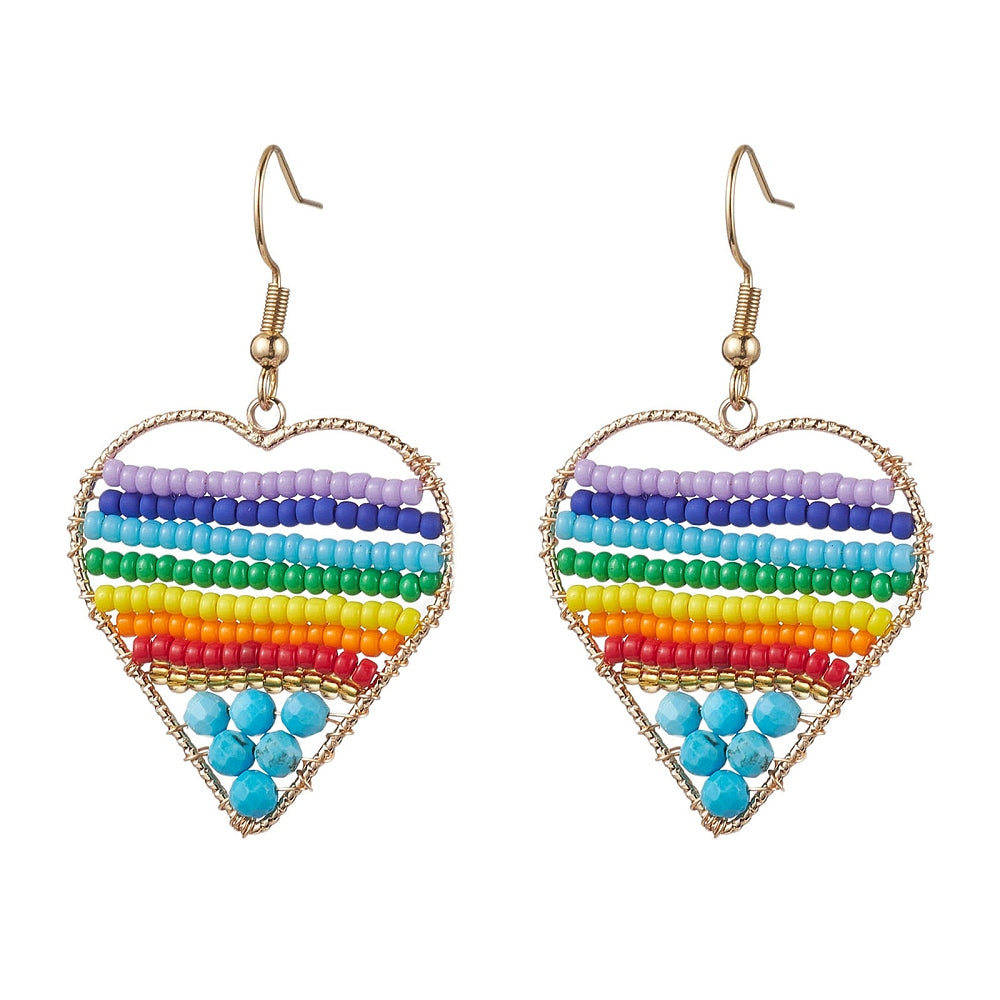 silver tone multicolor dyed magnesite and glass seed bead rainbow heart earrings with ear wires over white background. 