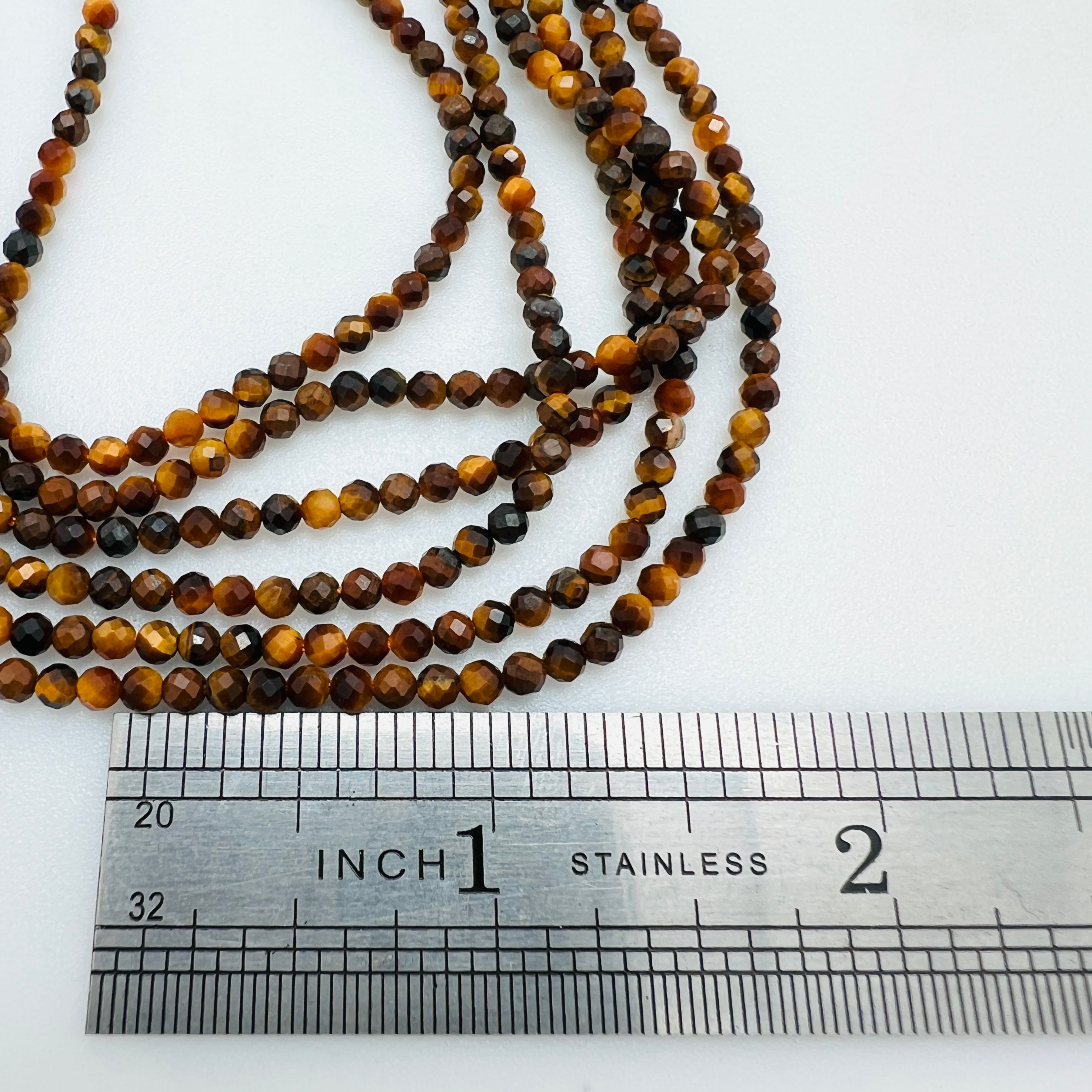 Tiger's Eye Faceted Rounds