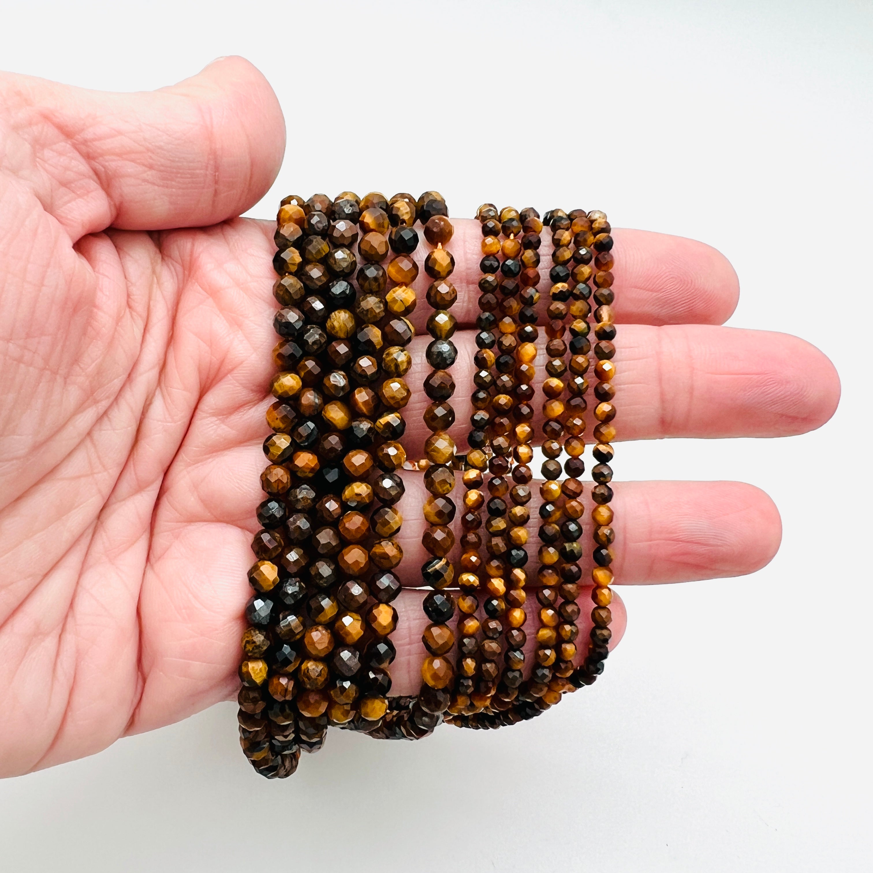 Tiger's Eye Faceted Rounds