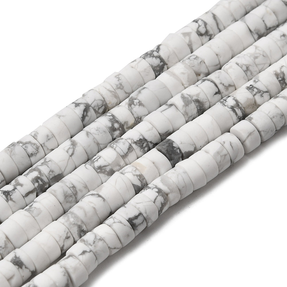 five natural Howlite Heishi bead strands over white surface. 